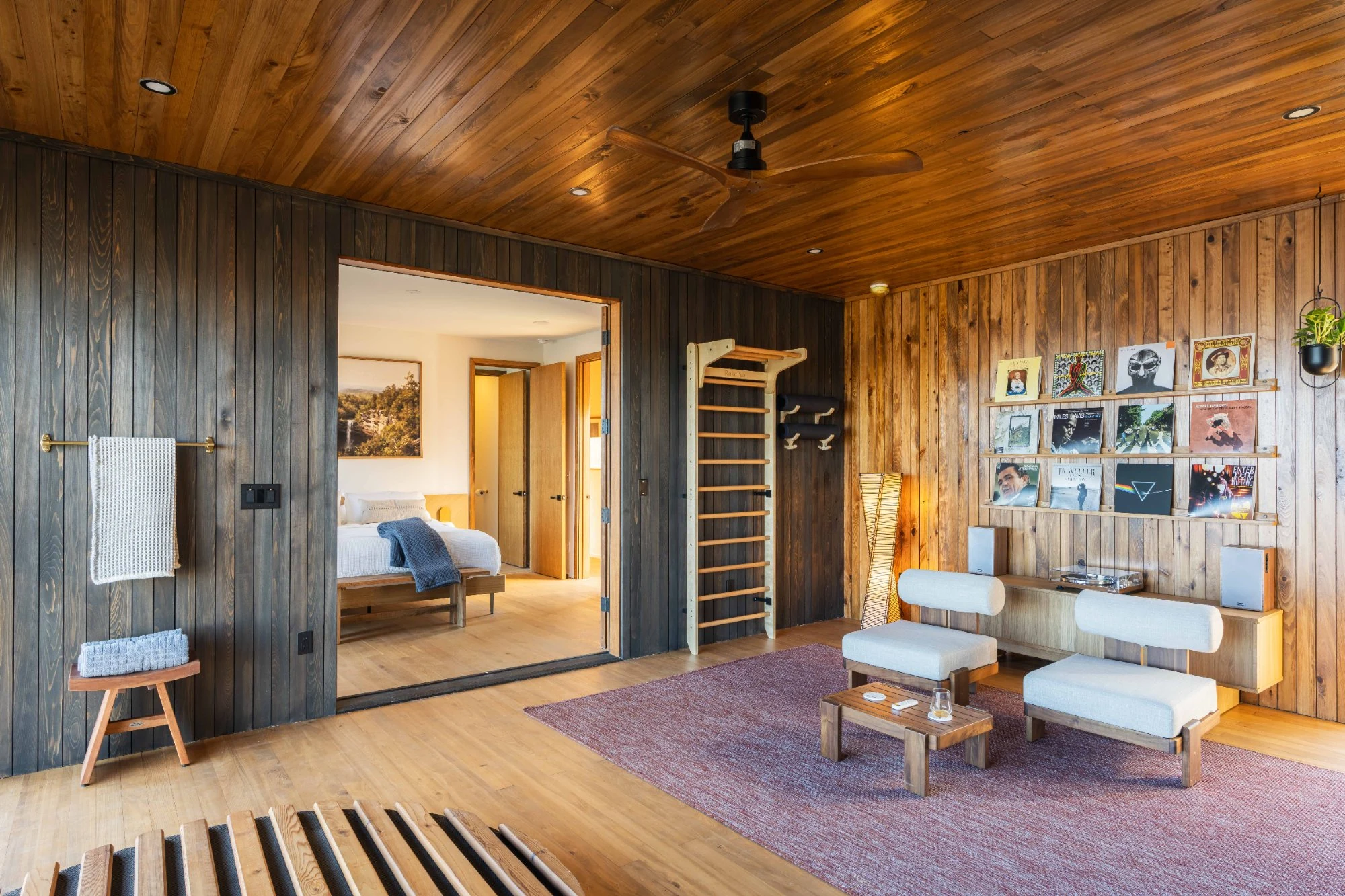 Modern music lounge and vinyl record station with curated albums in a luxury Sewanee vacation rental