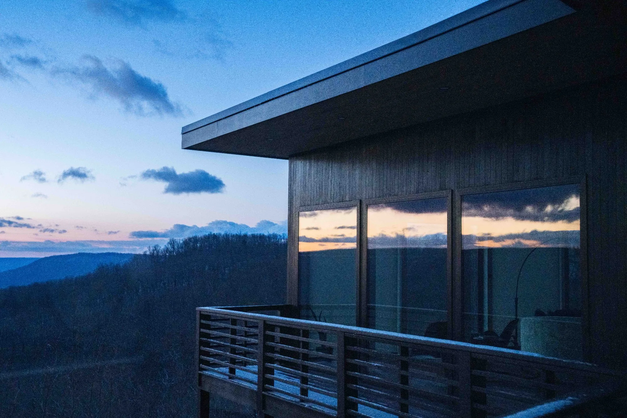 Jackson Point midcentury modern luxury home at blue hour dusk in Sewanee, Tennessee